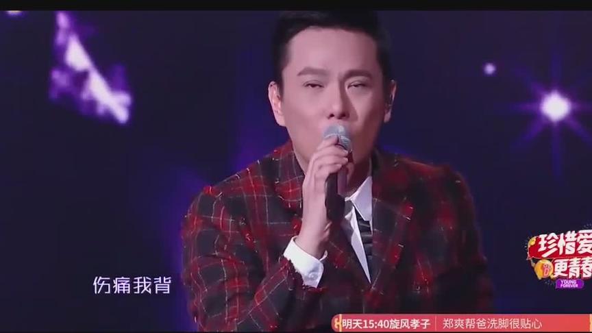 [图]张信哲的登台再唱30年前的成名曲，撕心裂肺的回忆，真情流露！